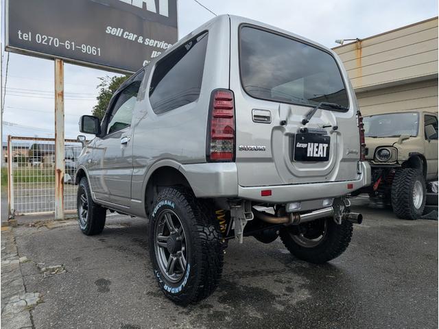ジムニー ランドベンチャー　１０型／ユーザー買取車／１インチリフトアップ／社外前後バンパー／タイヤジオランダーＸ－ＡＴ／スキッドプレート／ＬＥＤ社外テール／社外マフラーＨＫＳ／社外ナビ、ナンバー移設／ＥＴＣ／ＭＴ５速（10枚目）