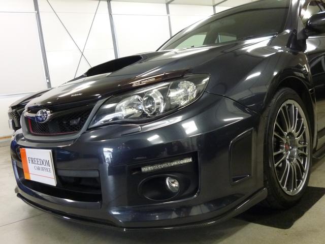 インプレッサ WRX STI Aライン STI4本出し パドルシフト付5AT プッシュスタート/スマートキー2本 パワー機能付オレンジレザーシート チルト/スライド機能付サンルーフ フルセグTV 走行中視聴 純正18インチアルミ カーボンパーツ(3枚目)