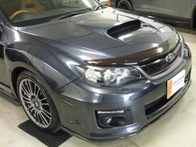 インプレッサ WRX STI Aライン STI4本出し パドルシフト付5AT プッシュスタート/スマートキー2本 パワー機能付オレンジレザーシート チルト/スライド機能付サンルーフ フルセグTV 走行中視聴 純正18インチアルミ カーボンパーツ(6枚目)