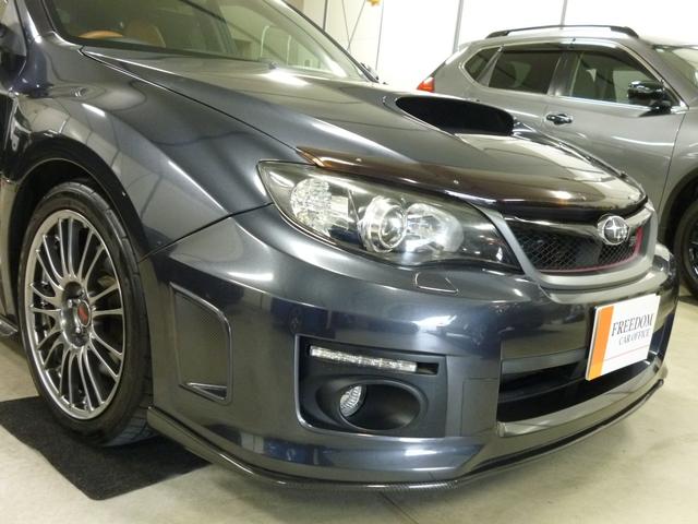 インプレッサ WRX STI Aライン STI4本出し パドルシフト付5AT プッシュスタート/スマートキー2本 パワー機能付オレンジレザーシート チルト/スライド機能付サンルーフ フルセグTV 走行中視聴 純正18インチアルミ カーボンパーツ(7枚目)