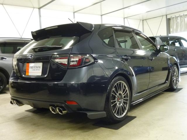 インプレッサ WRX STI Aライン STI4本出し パドルシフト付5AT プッシュスタート/スマートキー2本 パワー機能付オレンジレザーシート チルト/スライド機能付サンルーフ フルセグTV 走行中視聴 純正18インチアルミ カーボンパーツ(9枚目)