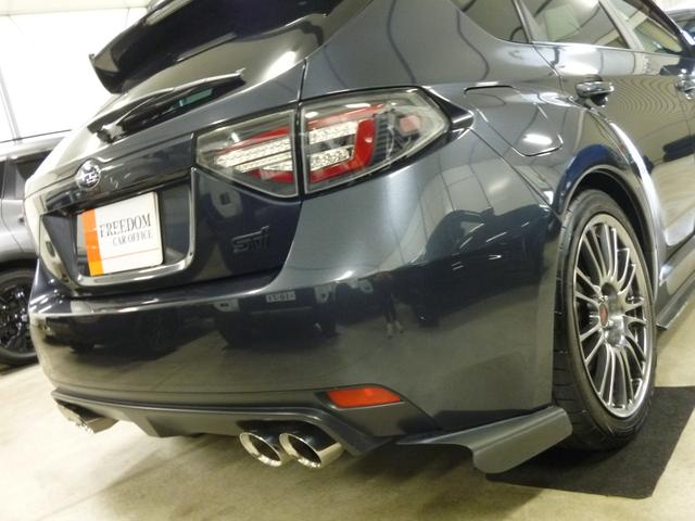 インプレッサ WRX STI Aライン STI4本出し パドルシフト付5AT プッシュスタート/スマートキー2本 パワー機能付オレンジレザーシート チルト/スライド機能付サンルーフ フルセグTV 走行中視聴 純正18インチアルミ カーボンパーツ(11枚目)
