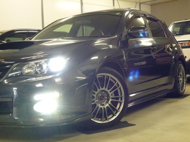 インプレッサ WRX STI Aライン STI4本出し パドルシフト付5AT プッシュスタート/スマートキー2本 パワー機能付オレンジレザーシート チルト/スライド機能付サンルーフ フルセグTV 走行中視聴 純正18インチアルミ カーボンパーツ(34枚目)