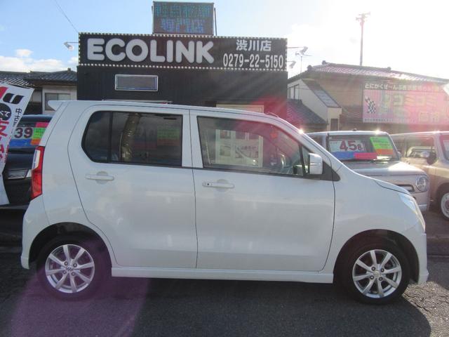 ワゴンＲ ＦＸリミテッド　アイドリングストップ・ナビ・ＴＶ・ＣＤ・スマートキー・プッシュスタート・オートエアコン・ベンチシート・ウィンカーミラー・ＨＩＤライト・アルミホイール（10枚目）