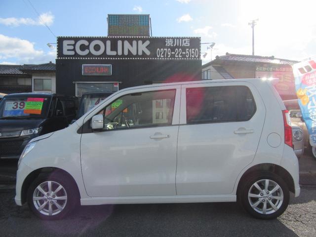 ワゴンＲ ＦＸリミテッド　アイドリングストップ・ナビ・ＴＶ・ＣＤ・スマートキー・プッシュスタート・オートエアコン・ベンチシート・ウィンカーミラー・ＨＩＤライト・アルミホイール（11枚目）