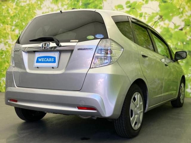 フィットハイブリッド ハイブリッド 純正 SDナビ/ETC/EBD付ABS/アイドリングストップ/クルーズコントロール/バックモニター/ワンセグTV/エアバッグ 運転席/エアバッグ 助手席/パワーウインドウ/キーレスエントリー(3枚目)