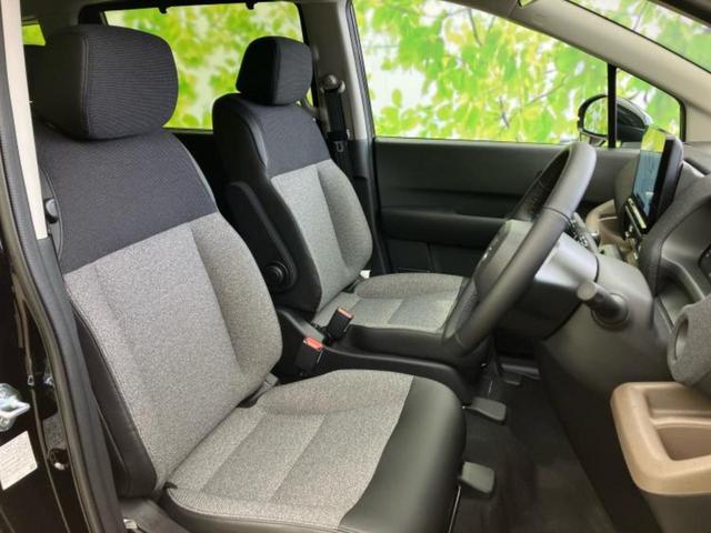 フリード ｅＨＥＶエアーＥＸ　保証書／純正　１１インチ　メモリーナビ／ホンダセンシング／両側電動スライドドア／シートヒーター　前席／車線逸脱防止支援システム／登録済未使用車／ヘッドランプ　ＬＥＤ／Ｂｌｕｅｔｏｏｔｈ接続　禁煙車（5枚目）