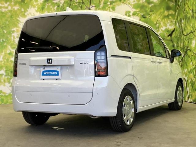 フリード ｅＨＥＶエアー　保証書／純正　８インチ　ナビ／ホンダセンシング／両側電動スライドドア／車線逸脱防止支援システム／登録済未使用車／ヘッドランプ　ＬＥＤ／ＵＳＢジャック／Ｂｌｕｅｔｏｏｔｈ接続／ＥＢＤ付ＡＢＳ　禁煙車（3枚目）