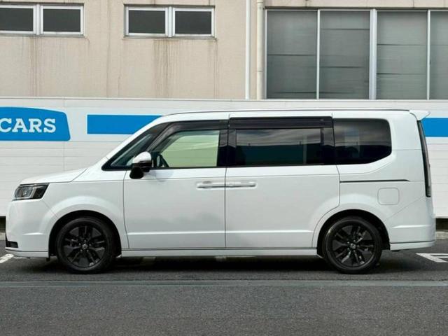 ステップワゴン ｅＨＥＶスパーダ　新品タイヤ／保証書／純正　１１インチ　ＳＤナビ／フリップダウンモニター　純正　１５．６インチ／ホンダセンシング／両側電動スライドドア／シートヒーター　前席／マルチビューカメラシステム　後席モニター（2枚目）