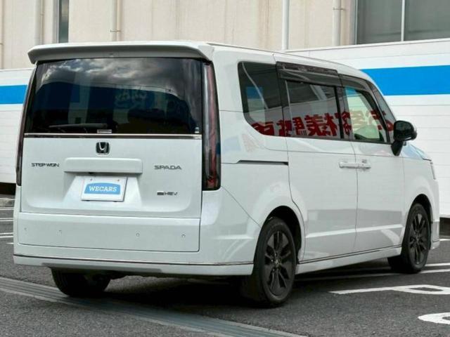 ステップワゴン ｅＨＥＶスパーダ　新品タイヤ／保証書／純正　１１インチ　ＳＤナビ／フリップダウンモニター　純正　１５．６インチ／ホンダセンシング／両側電動スライドドア／シートヒーター　前席／マルチビューカメラシステム　後席モニター（3枚目）