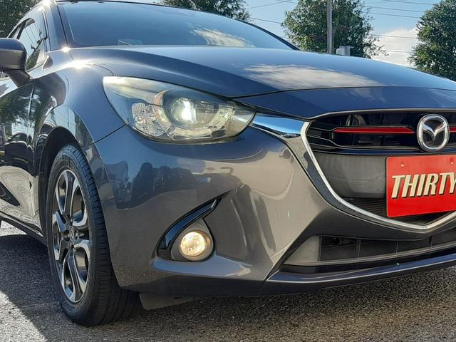 デミオ ＸＤツーリング　６速ＭＴ　ワンオーナー　Ｒスポイラー　純正ナビ　バックモニター　クルーズコントロール　ビルトインＥＴＣ　ＬＥＤ　アクティブドライビングディスプレイ　フォグランプ　純正アルミ（7枚目）