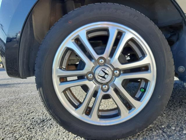 N-BOX G ターボSSパッケージ 特別仕様車 純正ナビ スマートキー 両側電動スライド バックモニター Bluetooth ETC HIDオートライト クルーズコントロール パドルシフト 革巻ステアリング 14インチアルミ(62枚目)