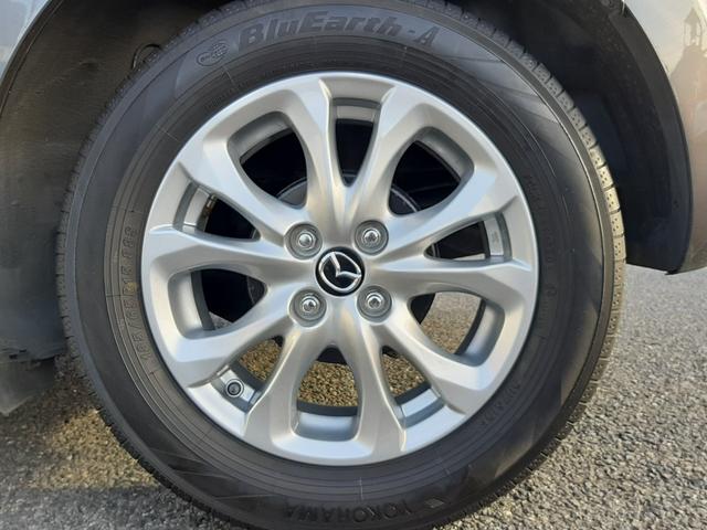 デミオ １３Ｓツーリング　５速ＭＴ　リアスポイラー　シートヒーター　禁煙車　マツダコネクトナビ　ヘッドアップディスプレイ　バックカメラ　衝突軽減ブレーキ　ＬＥＤオートライト　純正１５インチアルミ　スマートキー２個（67枚目）