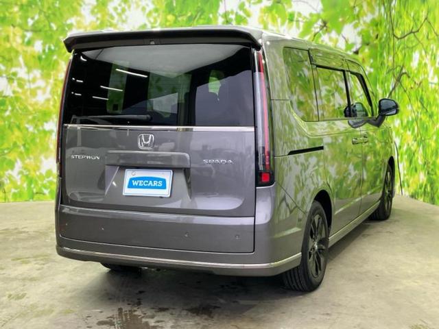 ステップワゴン スパーダ 保証書/純正 11インチ メモリーナビ/フリップダウンモニター 純正 15.6インチ/ホンダセンシング/両側電動スライドドア/シートヒーター 前席/車線逸脱防止支援システム/電動バックドア DVD再生(3枚目)