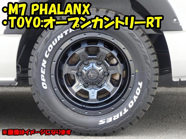 ハイエースワゴン ＧＬ　対面アレンジ　ヴィンテージブラウン内装　ＭＩＤ　Ｍ７ファランクス　ＴＯＹＯオープンカントリータイヤ　ＪＡＯＳマッドガード　ＦＤフロントブッシュバー　シートカバー　艶消し木目調ステアリング＆インテリアパ（5枚目）