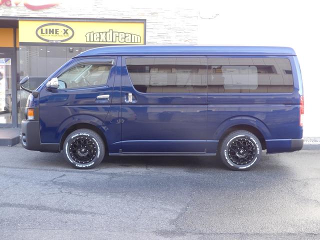 ハイエースワゴン GL FDシートカバー 黒木目調ステアリング&インテリアパネル 片側パワースライドドア バックモニター内蔵インナーミラー フルセグ地デジナビ フリップダウンモニター 天井スピーカー 新品アルミホイール&タイ(8枚目)