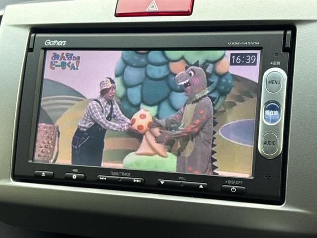 フリード G 新品タイヤ/保証書/純正 SDナビ/ドライブレコーダー 社外/Bluetooth接続/ETC/EBD付ABS/横滑り防止装置/ワンセグTV/DVD/エアバッグ 運転席/エアバッグ 助手席 DVD再生(12枚目)