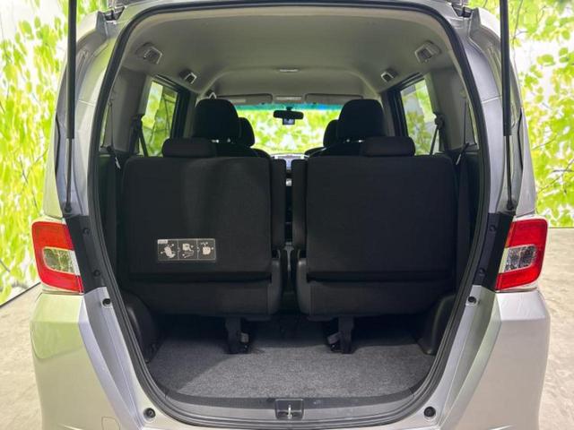 フリード G 新品タイヤ/保証書/純正 SDナビ/ドライブレコーダー 社外/Bluetooth接続/ETC/EBD付ABS/横滑り防止装置/ワンセグTV/DVD/エアバッグ 運転席/エアバッグ 助手席 DVD再生(19枚目)