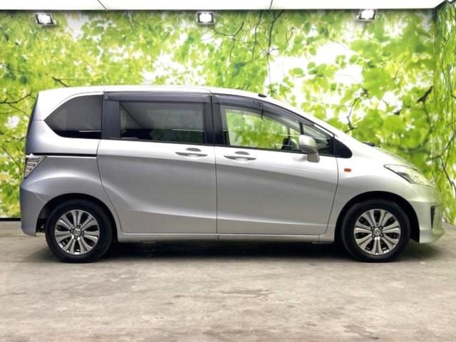 フリード G 新品タイヤ/保証書/純正 SDナビ/ドライブレコーダー 社外/Bluetooth接続/ETC/EBD付ABS/横滑り防止装置/ワンセグTV/DVD/エアバッグ 運転席/エアバッグ 助手席 DVD再生(32枚目)