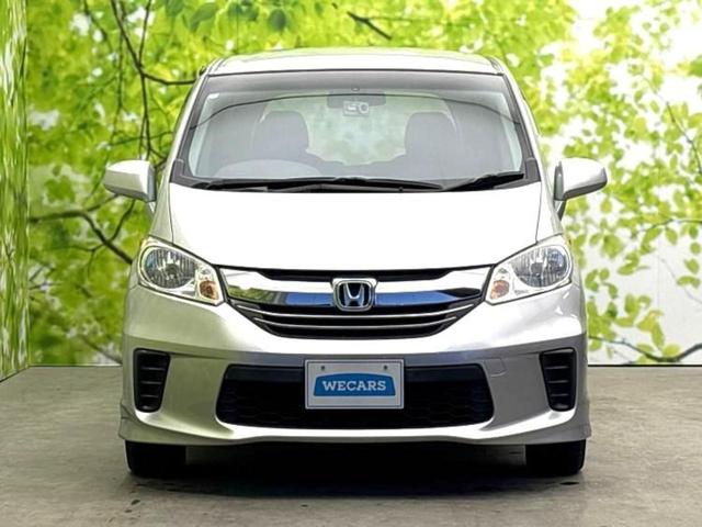 フリード G 新品タイヤ/保証書/純正 SDナビ/ドライブレコーダー 社外/Bluetooth接続/ETC/EBD付ABS/横滑り防止装置/ワンセグTV/DVD/エアバッグ 運転席/エアバッグ 助手席 DVD再生(54枚目)