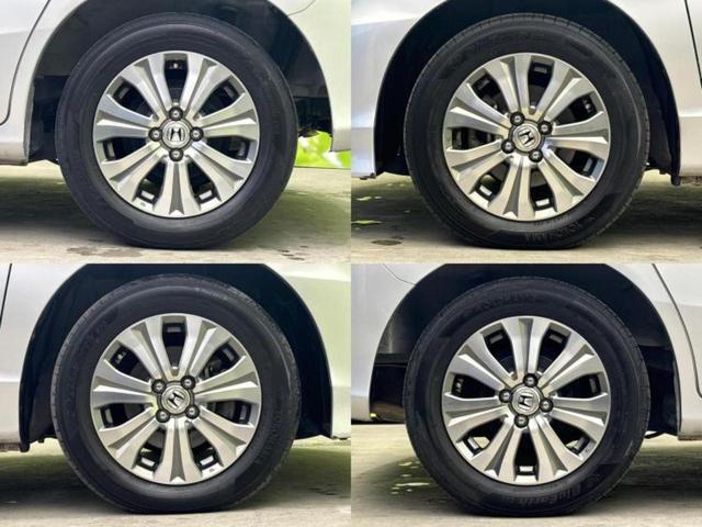 フリード G 新品タイヤ/保証書/純正 SDナビ/ドライブレコーダー 社外/Bluetooth接続/ETC/EBD付ABS/横滑り防止装置/ワンセグTV/DVD/エアバッグ 運転席/エアバッグ 助手席 DVD再生(62枚目)