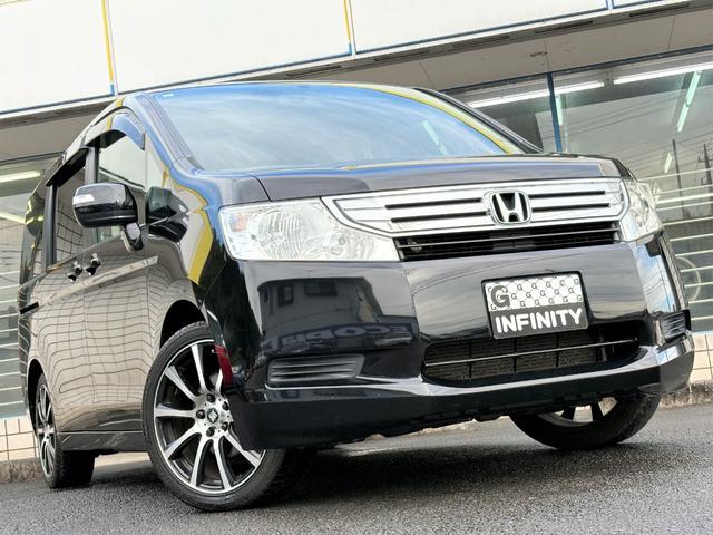 ステップワゴン G HIDエディション /特別仕様車/車検:2年付/両側電動スライドドア/フリップダウンモニター/純正ナビ/バックカメラ/ワンセグ/DVD再生/社外18AW/HID/ETC/AUTOエアコン/タイミングチェーン(2枚目)