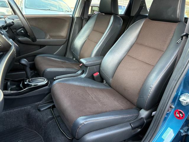 フィットシャトルハイブリッド ハイブリッド・ナビプレミアムセレクション /記録簿/車検:2年付/走行80000km/純正ナビ/バックカメラ/ワンセグ/DVD再生/純正15AW/HIDヘッドライト/ETC/スマートキー/ハーフレザー/クルーズコントロール/タイミングチェーン(8枚目)