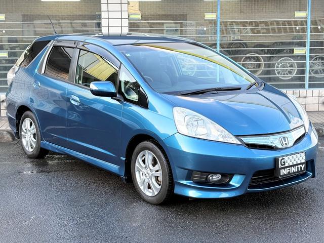 フィットシャトルハイブリッド ハイブリッド・ナビプレミアムセレクション /記録簿/車検:2年付/走行80000km/純正ナビ/バックカメラ/ワンセグ/DVD再生/純正15AW/HIDヘッドライト/ETC/スマートキー/ハーフレザー/クルーズコントロール/タイミングチェーン(11枚目)