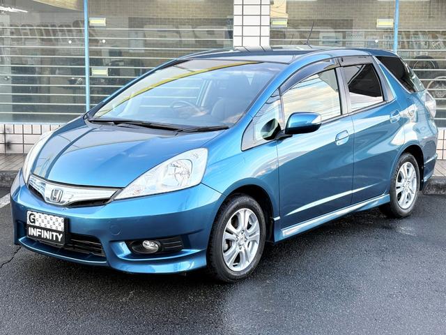 フィットシャトルハイブリッド ハイブリッド・ナビプレミアムセレクション /記録簿/車検:2年付/走行80000km/純正ナビ/バックカメラ/ワンセグ/DVD再生/純正15AW/HIDヘッドライト/ETC/スマートキー/ハーフレザー/クルーズコントロール/タイミングチェーン(23枚目)