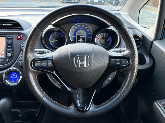 フィットシャトルハイブリッド ハイブリッド・ナビプレミアムセレクション /記録簿/車検:2年付/走行80000km/純正ナビ/バックカメラ/ワンセグ/DVD再生/純正15AW/HIDヘッドライト/ETC/スマートキー/ハーフレザー/クルーズコントロール/タイミングチェーン(28枚目)