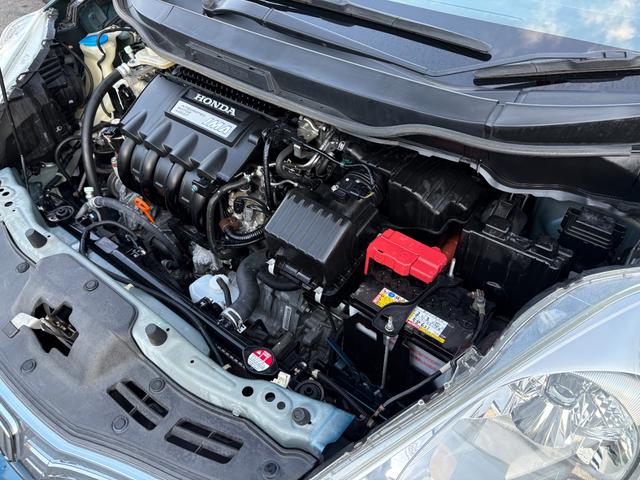 フィットシャトルハイブリッド ハイブリッド・ナビプレミアムセレクション /記録簿/車検:2年付/走行80000km/純正ナビ/バックカメラ/ワンセグ/DVD再生/純正15AW/HIDヘッドライト/ETC/スマートキー/ハーフレザー/クルーズコントロール/タイミングチェーン(42枚目)