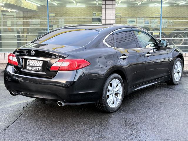 フーガ ２５０ＧＴ　／衝突被害軽減ブレーキ／レーダークルーズコントロール／電動シート／助手席オットマン電動シート／純ナビ／サイド＋バックカメラ／Ｂｌｕｅｔｏｏｔｈ／フルセグ／１８ＡＷ／ＨＩＤ／ＥＴＣ／スマキー／Ｔチェーン（14枚目）