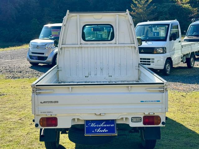 ミニキャブトラック VXスペシャルエディション パートタイム4WD(HI/LO) エアコン・パワステ 専用ホワイトスチールホイール フォグランプ(3枚目)