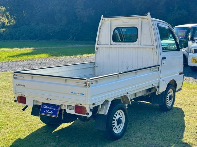 ミニキャブトラック VXスペシャルエディション パートタイム4WD(HI/LO) エアコン・パワステ 専用ホワイトスチールホイール フォグランプ(8枚目)