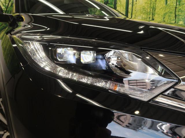 ハイブリッドRS・ホンダセンシング 禁煙車 寒冷地仕様 純正7型SDナビ フルセグ バックカメラ ETC レーンキープ シートヒーター 純正18インチアルミホイール スマートキー LEDヘッドライト&LEDフォグライト オートライト(27枚目)