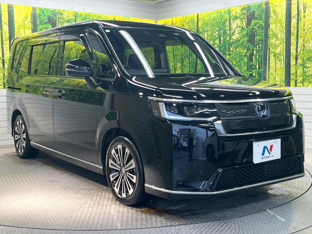 ステップワゴン ｅ：ＨＥＶスパーダ　プレミアムライン　両側電動スライドドア　純正１１型ナビ　全周囲カメラ　ホンダセンシング　アダプティブクルーズ　禁煙車　パワーバックドア　シートヒーター　ハーフレザー　ＬＥＤヘッド　スマートキー　ＢＳＭ　誤発進抑制機能（17枚目）