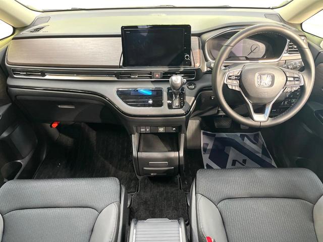 オデッセイハイブリッド e:HEVアブソルート・EX 両側電動スライドドア フリップダウン 純正10型ナビ マルチビューカメラシステム ホンダセンシング アダプティブクルーズコントロール 寒冷地仕様 AC100V電源 禁煙車 パワーバックドア(2枚目)