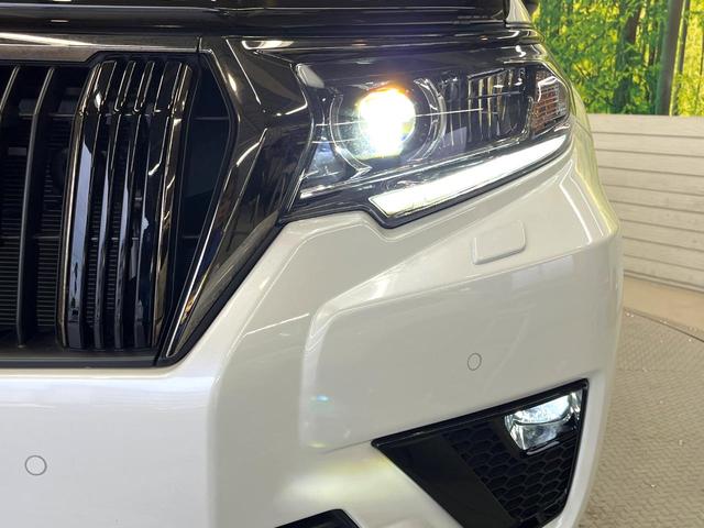 ランドクルーザープラド TX Lパッケージ 70thアニバーサリーリミテッド ムーンルーフ 4WD 7人乗り 純正9型ナビ セーフティセンス レーダークルーズ 禁煙車 パノラミックビューモニター ブラインドスポットモニター 本革シート 前席パワーシート シートエアコン(13枚目)