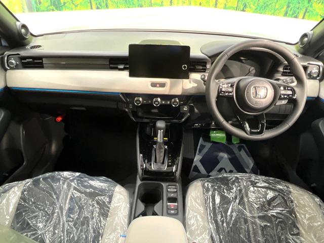 ヴェゼル e:HEV Z・PLaYパッケージ 登録済未使用車 パノラマルーフ 純正9型ナビ マルチビューカメラ アダプティブクルーズ シートヒーター ハーフレザーシート ハンズフリーパワーバックドア コーナーセンサー レーンキープ LEDヘッド(2枚目)