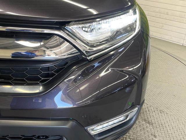 ＣＲ－Ｖハイブリッド ＥＸ・マスターピース　パノラミックサンルーフ　ホンダセンシング　アダプティブクルーズコントロール　純正ナビ　バックカメラ　禁煙車　寒冷地仕様　ハンズフリーパワーバックドア　パワーシート　シートヒーター　ドラレコ　本革シート（12枚目）