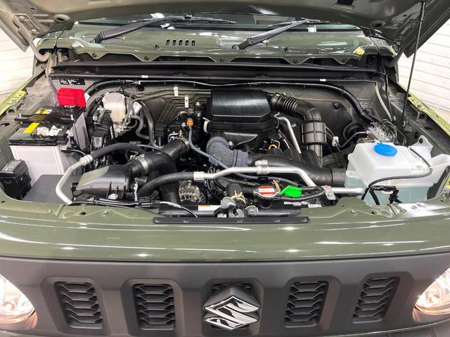 ジムニー XG 4WD MT 寒冷地仕様 デュアルブレーキサポート 禁煙車 シートヒーター ドラレコ ETC 車線逸脱警報 誤発信抑制機能 先行車発進お知らせ機能 オートライト 革巻ステアリング(18枚目)