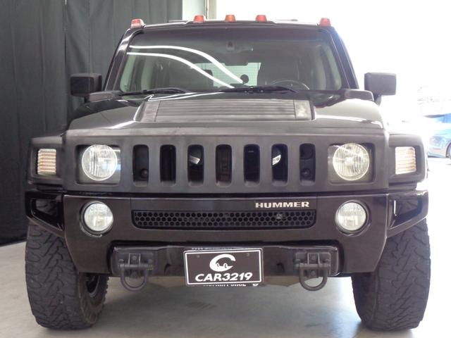 ハマーＨ３ 　三井物産　ウインカー＆テールカスタム　ルーフラック　サンルーフ　黒革　サイドステップ　ケンウッドナビ　地デジ　ＢＴ接続　バックカメラ　ＥＴＣ　パワーシート　社外１７インチ＋マッドタイヤ（6枚目）