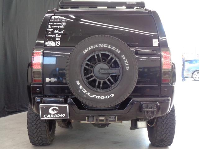 ハマーＨ３ 　三井物産　ウインカー＆テールカスタム　ルーフラック　サンルーフ　黒革　サイドステップ　ケンウッドナビ　地デジ　ＢＴ接続　バックカメラ　ＥＴＣ　パワーシート　社外１７インチ＋マッドタイヤ（7枚目）