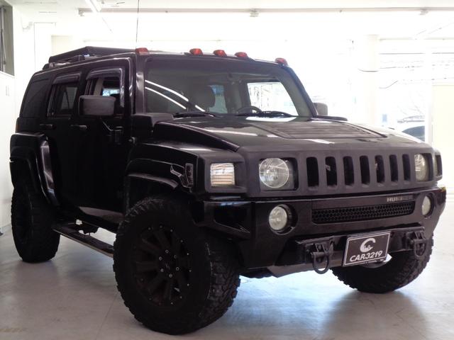 ハマーＨ３ 　三井物産　ウインカー＆テールカスタム　ルーフラック　サンルーフ　黒革　サイドステップ　ケンウッドナビ　地デジ　ＢＴ接続　バックカメラ　ＥＴＣ　パワーシート　社外１７インチ＋マッドタイヤ（8枚目）
