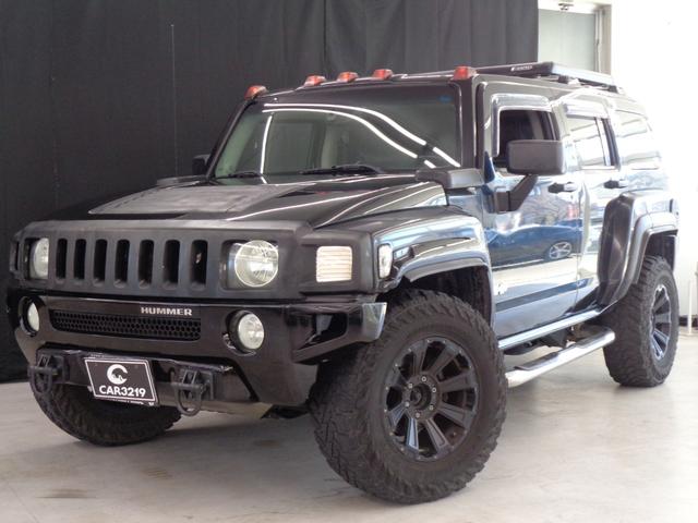 ハマーＨ３ 　三井物産　ウインカー＆テールカスタム　ルーフラック　サンルーフ　黒革　サイドステップ　ケンウッドナビ　地デジ　ＢＴ接続　バックカメラ　ＥＴＣ　パワーシート　社外１７インチ＋マッドタイヤ（9枚目）