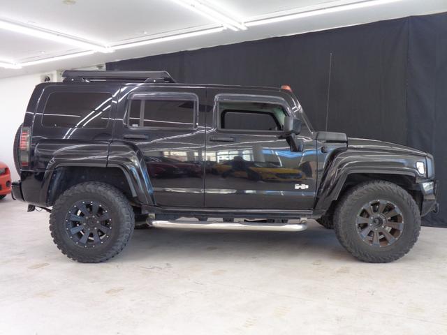 ハマーＨ３ 　三井物産　ウインカー＆テールカスタム　ルーフラック　サンルーフ　黒革　サイドステップ　ケンウッドナビ　地デジ　ＢＴ接続　バックカメラ　ＥＴＣ　パワーシート　社外１７インチ＋マッドタイヤ（10枚目）