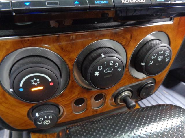 ハマーＨ３ 　三井物産　ウインカー＆テールカスタム　ルーフラック　サンルーフ　黒革　サイドステップ　ケンウッドナビ　地デジ　ＢＴ接続　バックカメラ　ＥＴＣ　パワーシート　社外１７インチ＋マッドタイヤ（15枚目）