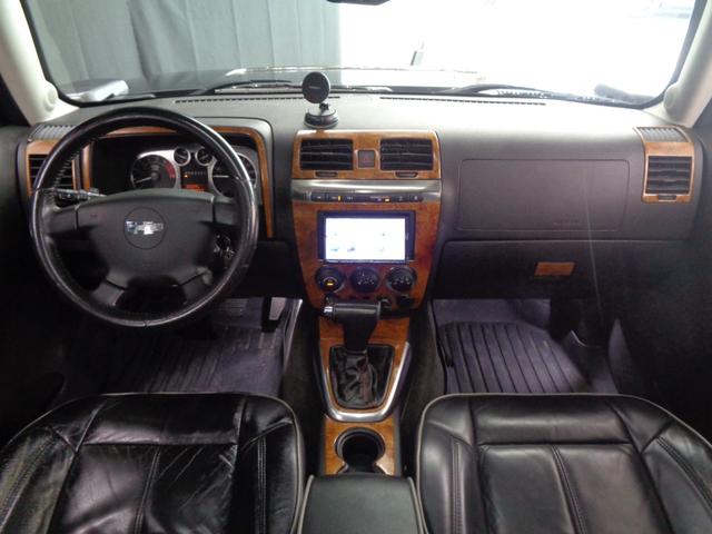 ハマーＨ３ 　三井物産　ウインカー＆テールカスタム　ルーフラック　サンルーフ　黒革　サイドステップ　ケンウッドナビ　地デジ　ＢＴ接続　バックカメラ　ＥＴＣ　パワーシート　社外１７インチ＋マッドタイヤ（22枚目）