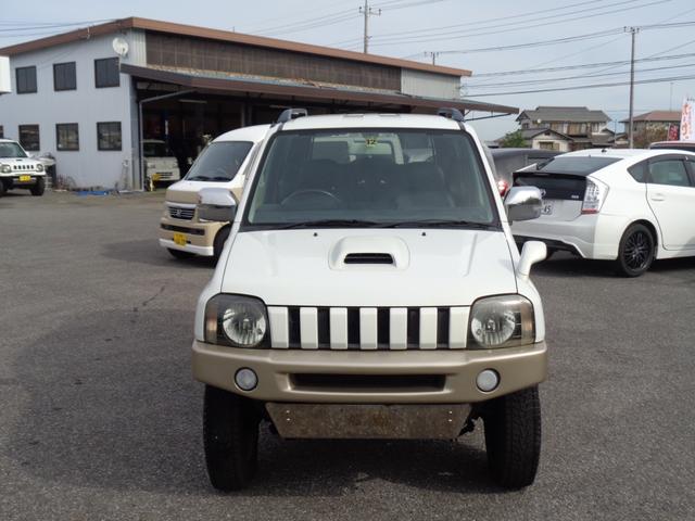 ジムニー ランドベンチャー ターボ パートタイム4WD 前後バンパー 背面タイヤ 16インチ リフトアップ マフラー HIDライト キーレス メモリーナビ DVD再生 CD ワンセグTV ハーフレザー 走行6.1万 取説記録簿(3枚目)