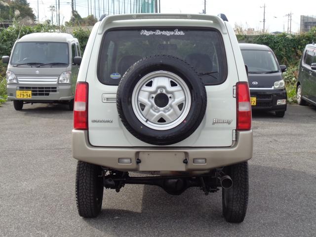 ジムニー ランドベンチャー ターボ パートタイム4WD 前後バンパー 背面タイヤ 16インチ リフトアップ マフラー HIDライト キーレス メモリーナビ DVD再生 CD ワンセグTV ハーフレザー 走行6.1万 取説記録簿(4枚目)